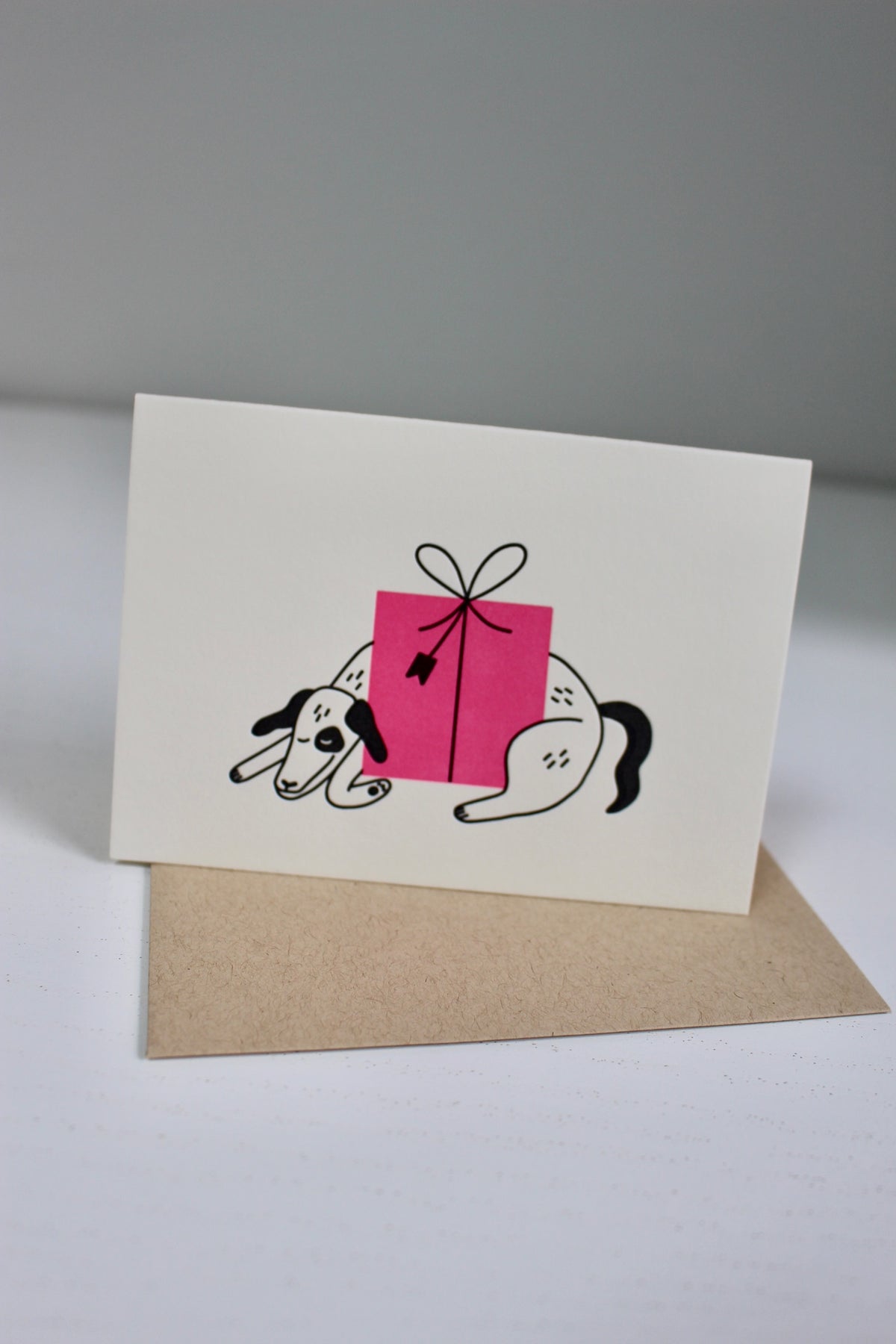 Dog With Present Greeting Card